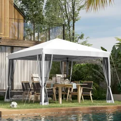 Outdoor gazebo with a white canopy and mesh curtains, set up next to a pool. It features a wooden dining table and chairs underneath, with trees and modern architecture in the background.