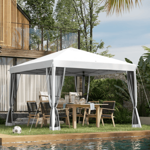 Outdoor gazebo with a white canopy and mesh curtains, set up next to a pool. It features a wooden dining table and chairs underneath, with trees and modern architecture in the background.