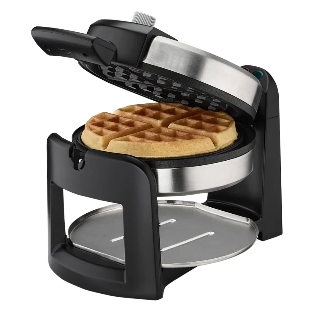 Cuisinart Round Flip Waffle Maker with a stainless steel exterior and black accents, featuring a rotating design for even cooking and a drip tray beneath.