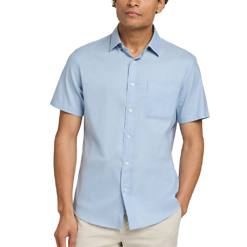 A light blue short-sleeve button-up shirt with a chest pocket, designed for casual wear. It's paired with light khaki pants.