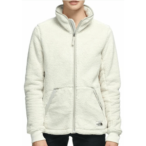 A cream-colored fleece jacket with a full front zipper and two pockets, featuring The North Face logo near the hem.