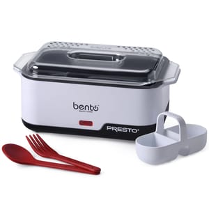 The Presto Bento Cooker is a compact electric appliance designed for cooking with a transparent lid, featuring a red spoon and fork, and a white container with a carrying handle.