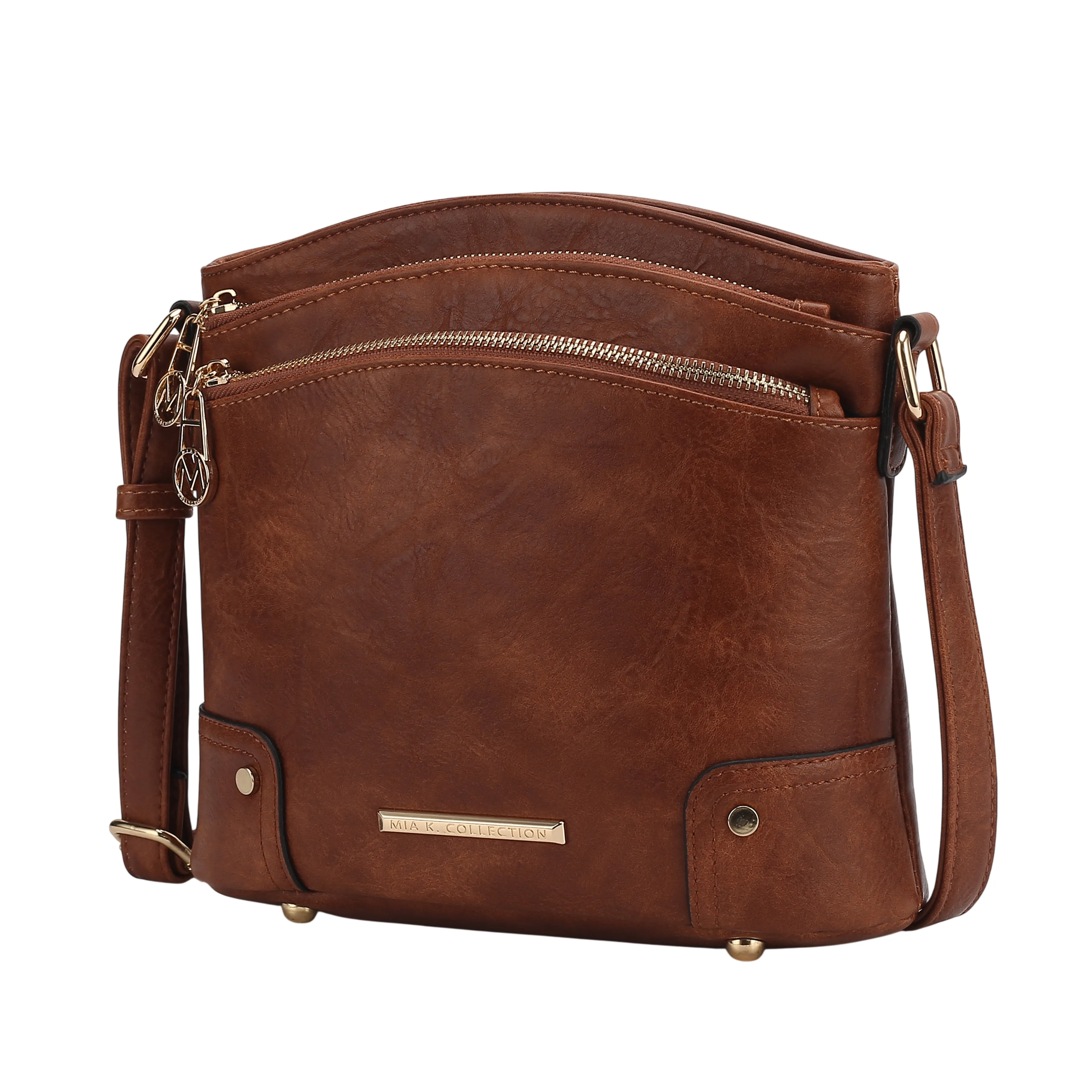 Brown leather crossbody bag with two front zippered pockets, a long adjustable strap, and shiny gold-tone accents, including a metal plate labeled \“MIA K COLLECTION.\“