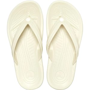 A pair of light-colored flip-flops with textured soles and a thong-style upper.