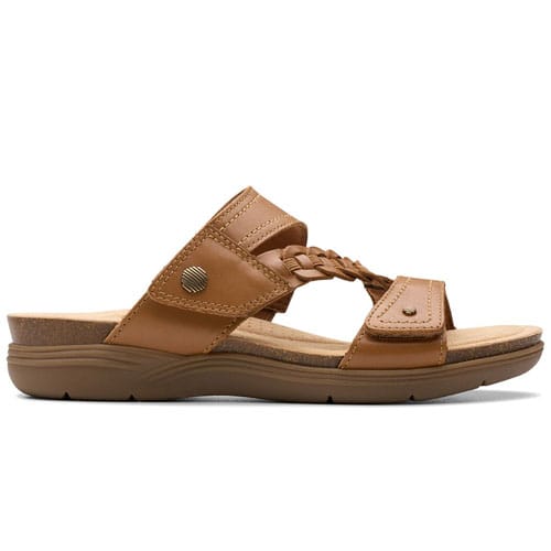 A brown sandal featuring a braided strap design with adjustable closures and a contoured footbed for comfort.
