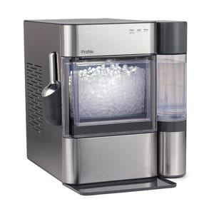 The GE Countertop XL Ice Maker is a stainless steel appliance featuring an ice scoop holder and a side water reservoir, designed to produce nugget ice efficiently.