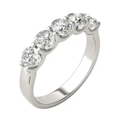 A platinum ring features five round-cut diamonds set in a shared prong design.