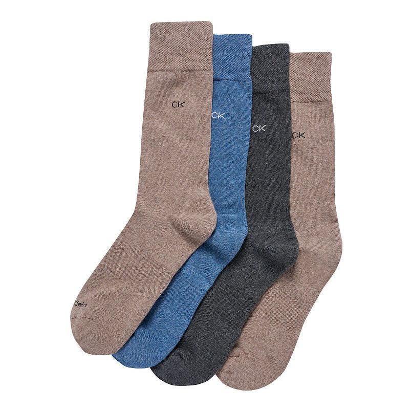 4-pack of Calvin Klein Hybrid Dress Socks in beige, blue, and dark grey tones, featuring a subtle \“CK\“ logo near the top.