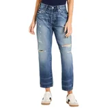 A person is wearing high-waisted, distressed blue jeans with frayed hems and white sneakers featuring a black accent.