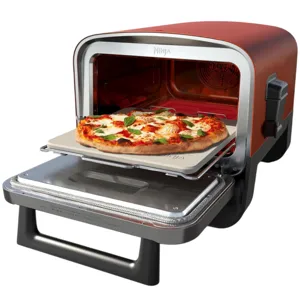 Ninja countertop pizza oven with a pizza cooking inside, featuring a pull-down door and a pizza stone for baking.