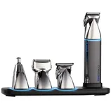 A grooming kit with a rechargeable chrome trimmer and three interchangeable heads for nose, detail, and shaving, all set in a sleek charging base.