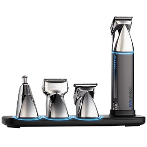A grooming kit with a rechargeable chrome trimmer and three interchangeable heads for nose, detail, and shaving, all set in a sleek charging base.