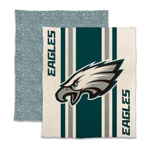 NFL throw blankets featuring a bold eagle logo on a striped background with \“EAGLES\“ written on the sides. The blankets have a green and cream color scheme.