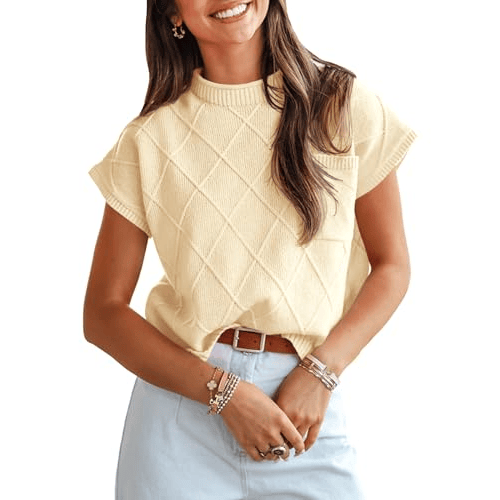 Sleeveless diamond-patterned yellow sweater with round neck, paired with a light blue skirt and accessorized with a brown belt and bracelets.