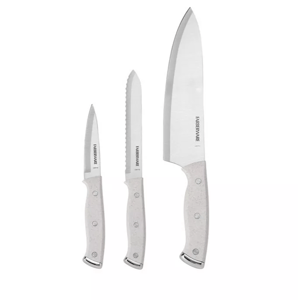 A three-piece Farberware knife set, featuring a paring knife, a serrated utility knife, and a chef's knife, all with light-colored handles.