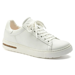 White leather sneaker with lace-up design and a gold accent on the heel.