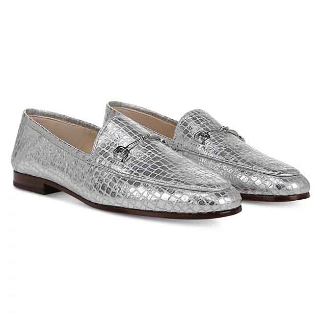 Pair of metallic silver loafers with a textured, crocodile-like pattern and a metal bit detail across the top. Suitable for formal or stylish casual wear.