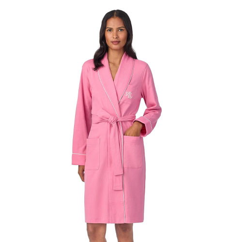 Pink bathrobe with a shawl collar and white piping, embroidered with \“RL\“ on the left chest, includes a tie belt and two front pockets.