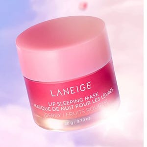Laneige Lip Sleeping Mask in Berry flavor, packaged in a pink and red gradient jar.