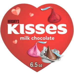 Hershey's Kisses milk chocolate in a heart-shaped package features red, pink, and foil-wrapped chocolates, weighing 6.5 oz.