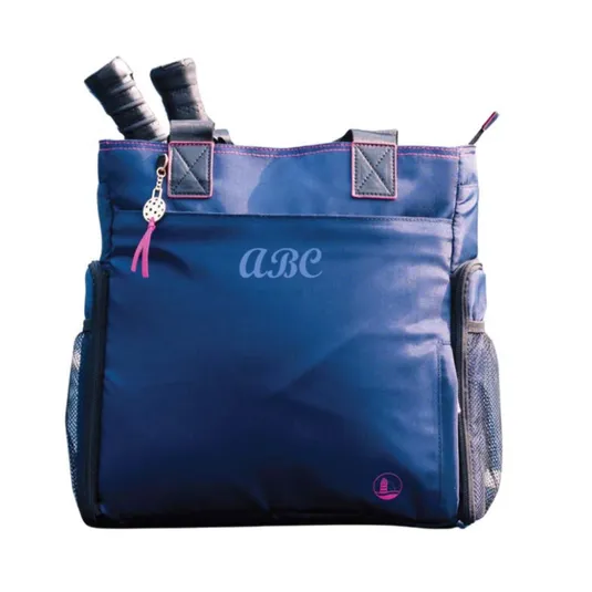 Navy blue tote bag designed for carrying tennis rackets, featuring two handles, side mesh pockets, a decorative tag, and \“ABC\“ printed on the front.