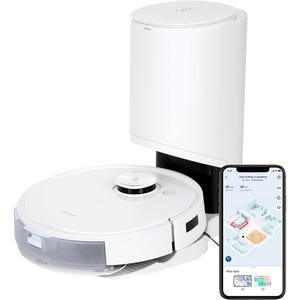 A robot vacuum cleaner with a docking station and a smartphone showing a cleaning map on its screen.