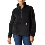 A person is wearing a black sherpa fleece pullover with a quarter-zip and front kangaroo pocket.