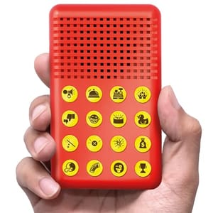 A handheld noise maker features a red casing with a yellow button panel displaying various icons, likely representing different sound effects.