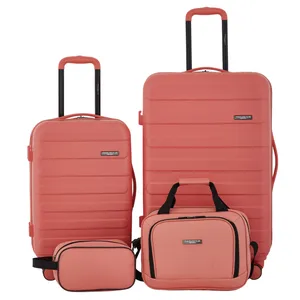 A four-piece luggage set in coral color, including two hard-shell suitcases with telescopic handles, a carry-on bag, and a toiletry case.
