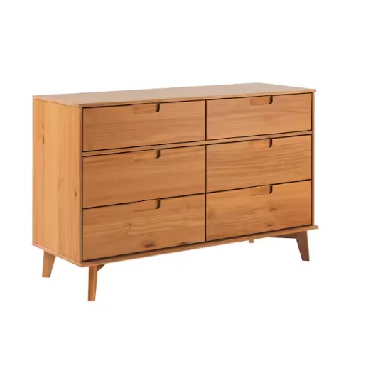 A mid-century modern wooden dresser with six drawers and angled legs, featuring a natural wood finish.
