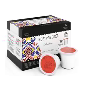Bestpresso Colombian Medium Roast Coffee Pods, compatible with Keurig K-Cup brewers, include 12 cups per box. Made from 100% Arabica coffee, the packaging features colorful, geometric designs and indicates the coffee is a product of Italy.