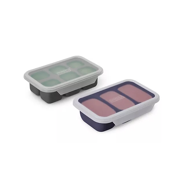 Two rectangular, collapsible silicone meal prep containers with airtight lids, one green and one red, each featuring three compartments.