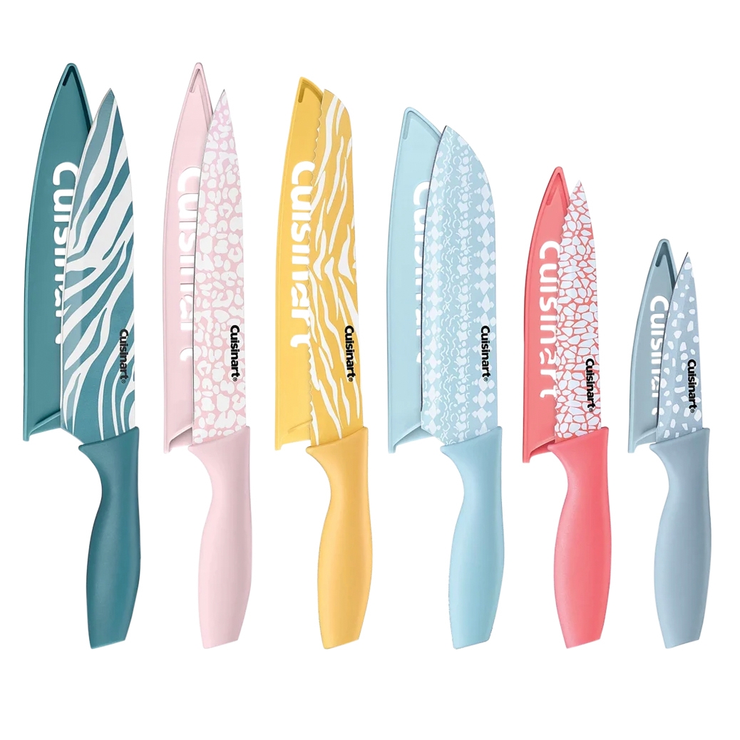 A set of six colorful Cuisinart knives with protective sheaths, each featuring a unique pattern, including zebra stripes, animal prints, and geometric designs.
