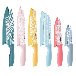 A set of six colorful Cuisinart knives with protective sheaths, each featuring a unique pattern, including zebra stripes, animal prints, and geometric designs.