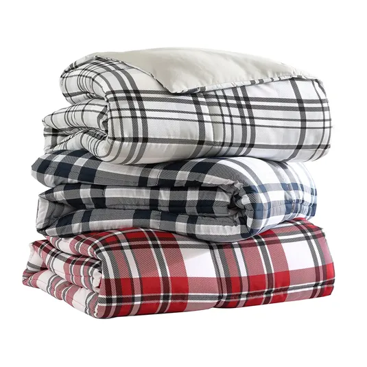 Stack of three plaid-patterned comforters in black, blue, and red.