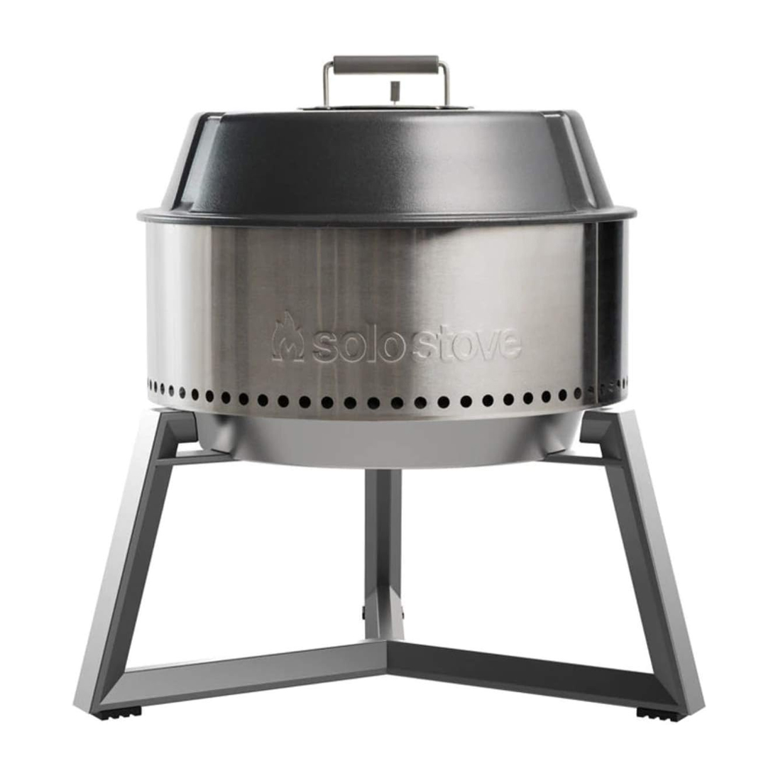 Solo Stove Ultimate Bundle: A smokeless fire pit with a stainless steel design, featuring a black lid and sturdy tripod stand, ideal for outdoor use.