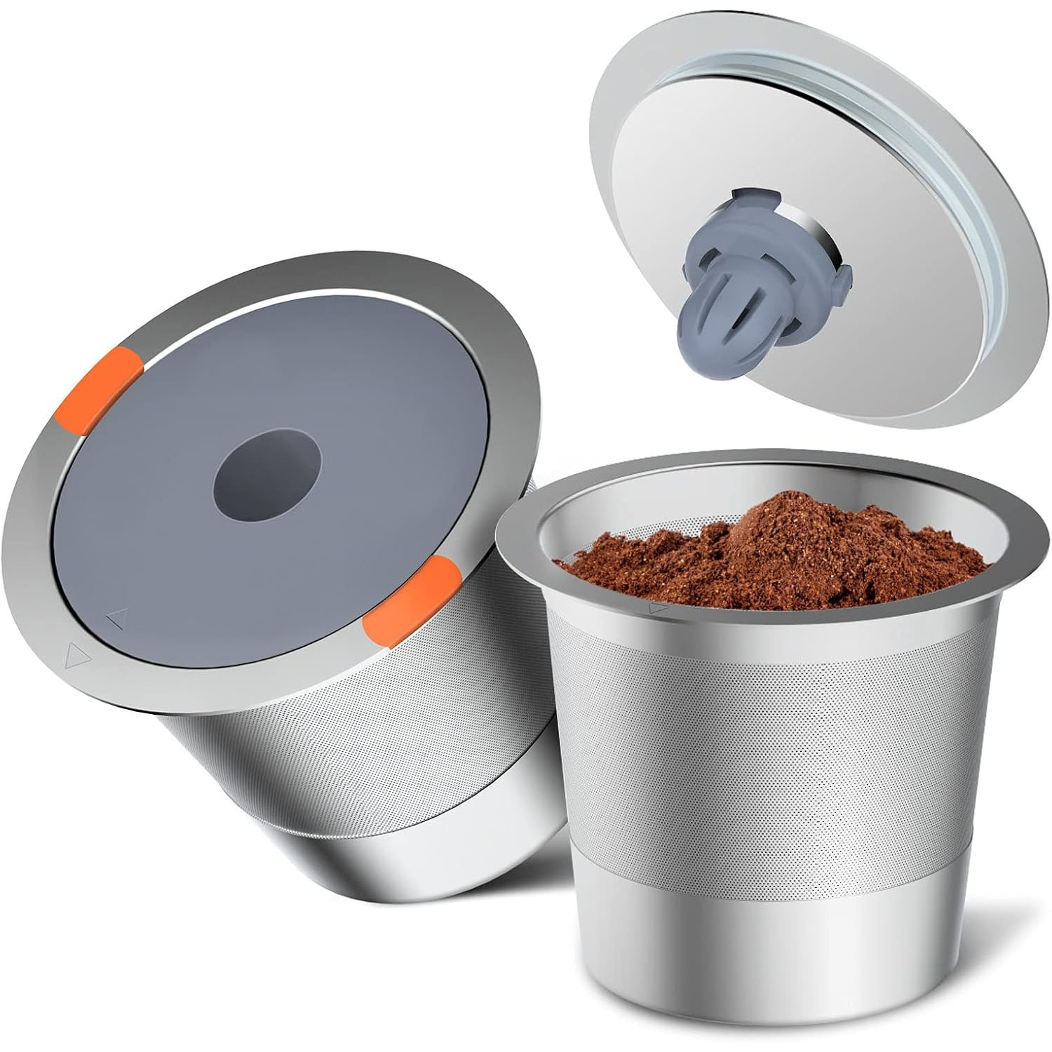 Two stainless steel reusable K-Cup pods with gray and orange lids, featuring a fine mesh design for use with ground coffee. One pod's lid is shown open, revealing the coffee grounds inside.