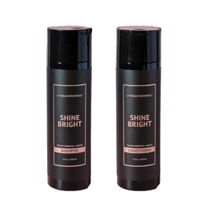 Beachwaver Shine Bright Shampoo and Conditioner feature vegan keratin and argan oil, each in an 8 fl oz (240 mL) bottle.