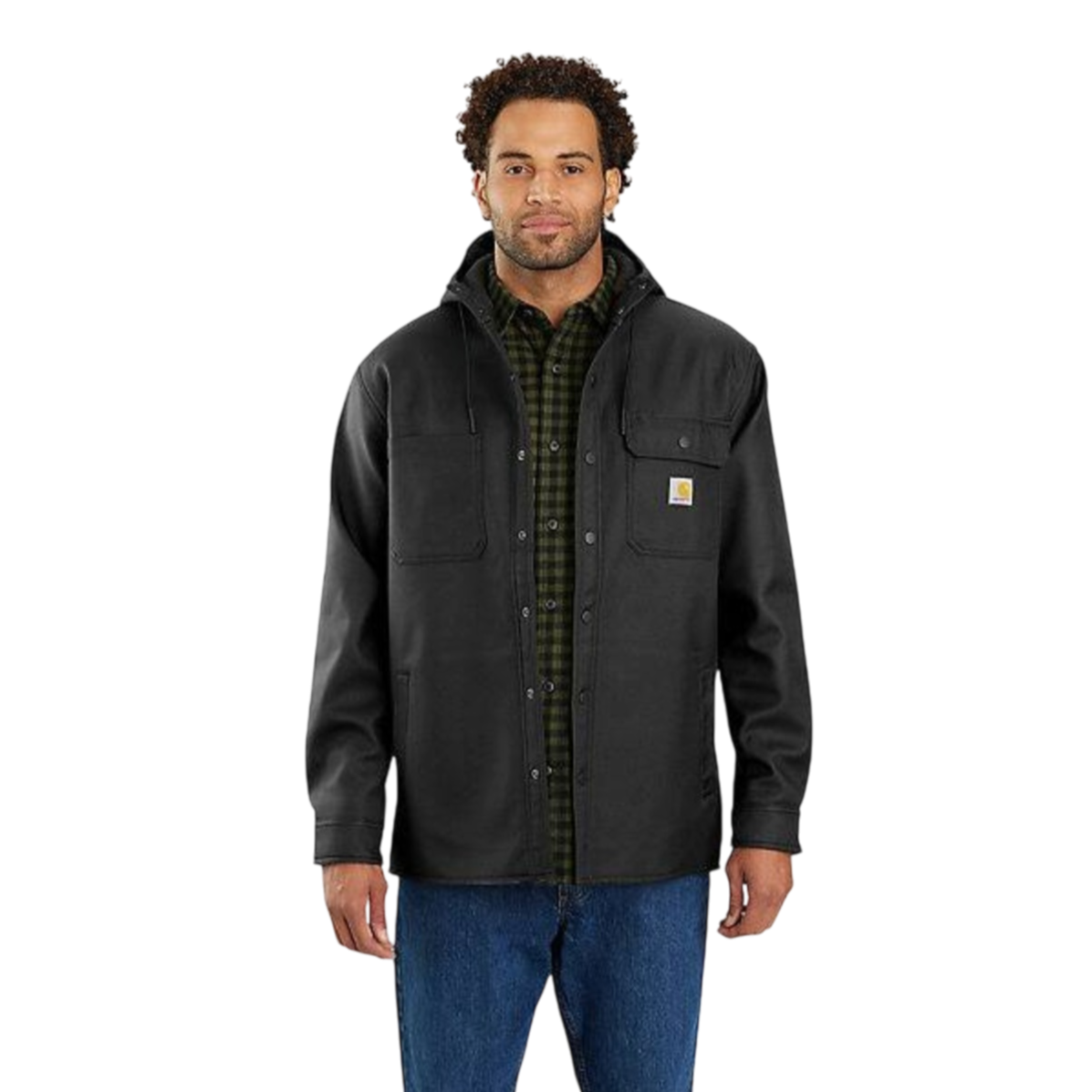 A man wears a black jacket with a hood and a Carhartt logo, over a green plaid shirt and blue jeans.