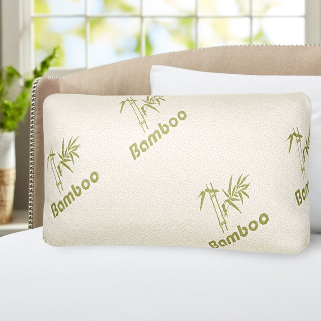 A bamboo pillow with embossed bamboo plant designs.
