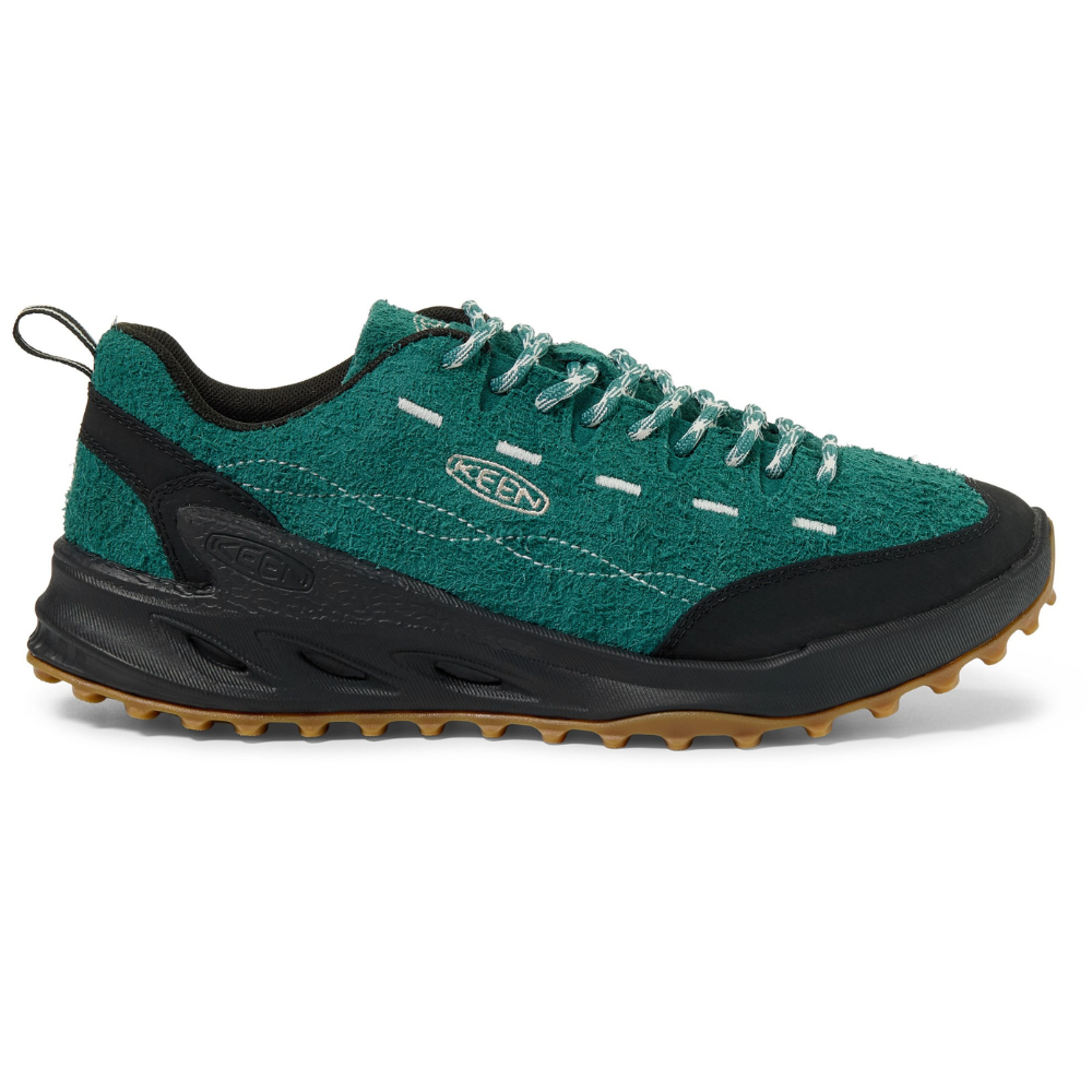 A teal Keen hiking shoe with a textured upper, black accents, rugged sole, and white stitching detail.