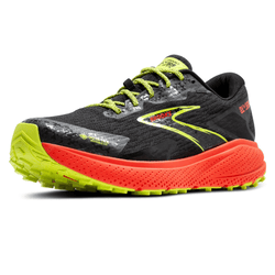 A Brooks running shoe featuring a black upper with lime green and red accents, including a GORE-TEX Invisible Fit technology for water resistance.