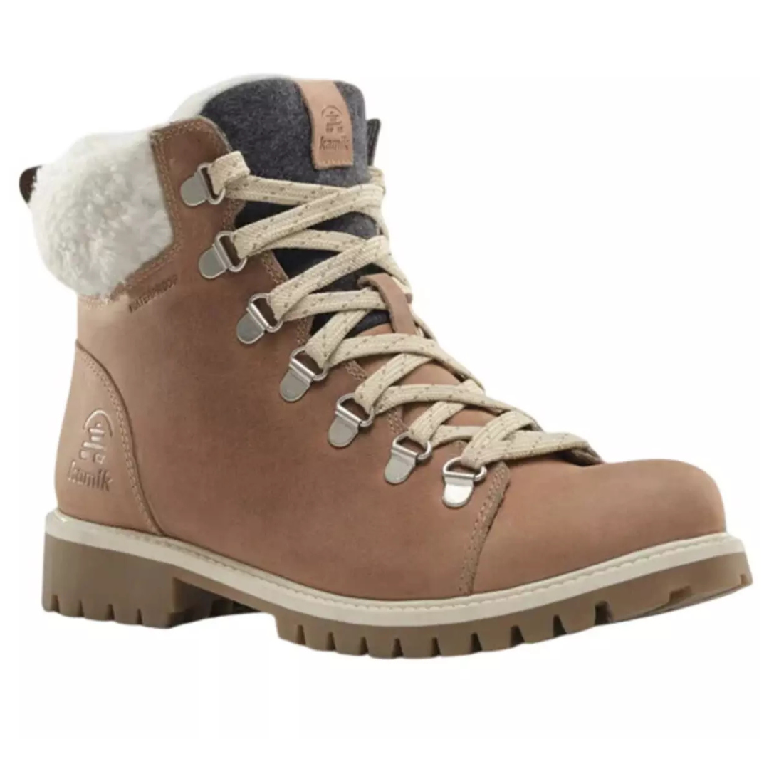 A brown Kamik lace-up winter boot features metal eyelets, a rugged sole, and a faux shearling collar for warmth.