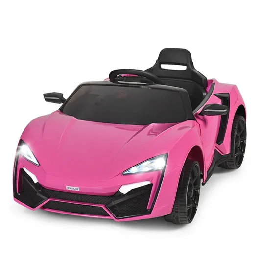 A pink children's electric ride-on car styled like a sports car, featuring working headlights, black wheels, and a steering wheel.