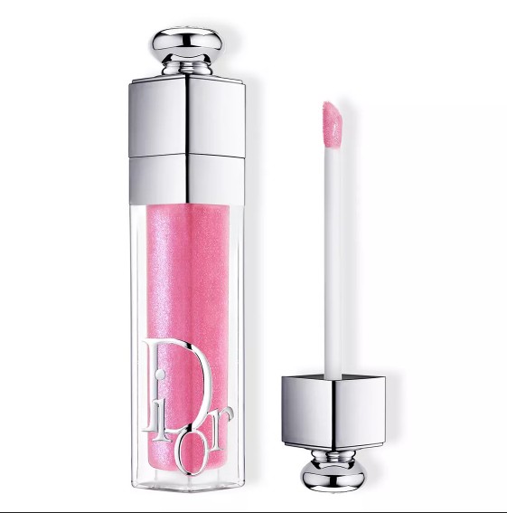 Pink lip gloss with shimmering finish, in a sleek cylindrical transparent container featuring silver accents and an applicator wand.