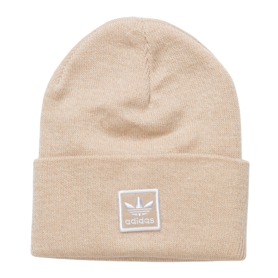 Beige knit beanie with a folded brim featuring the Adidas Trefoil logo in the center.
