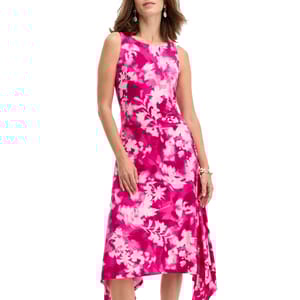 Sleeveless pink floral dress with a white pattern, featuring an asymmetrical hem and fitted waist.