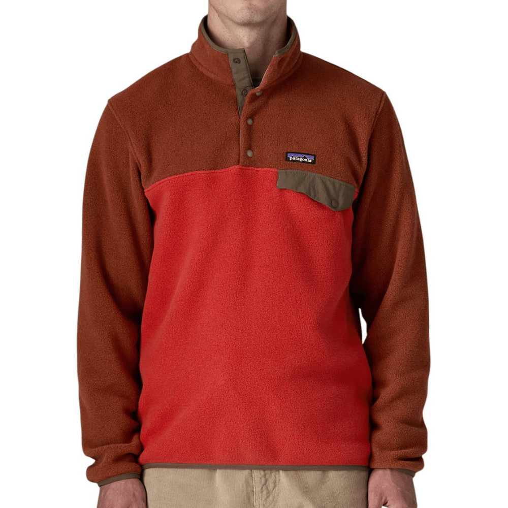 A two-tone fleece pullover with a high collar, buttoned placket, and a small chest pocket featuring a logo label.
