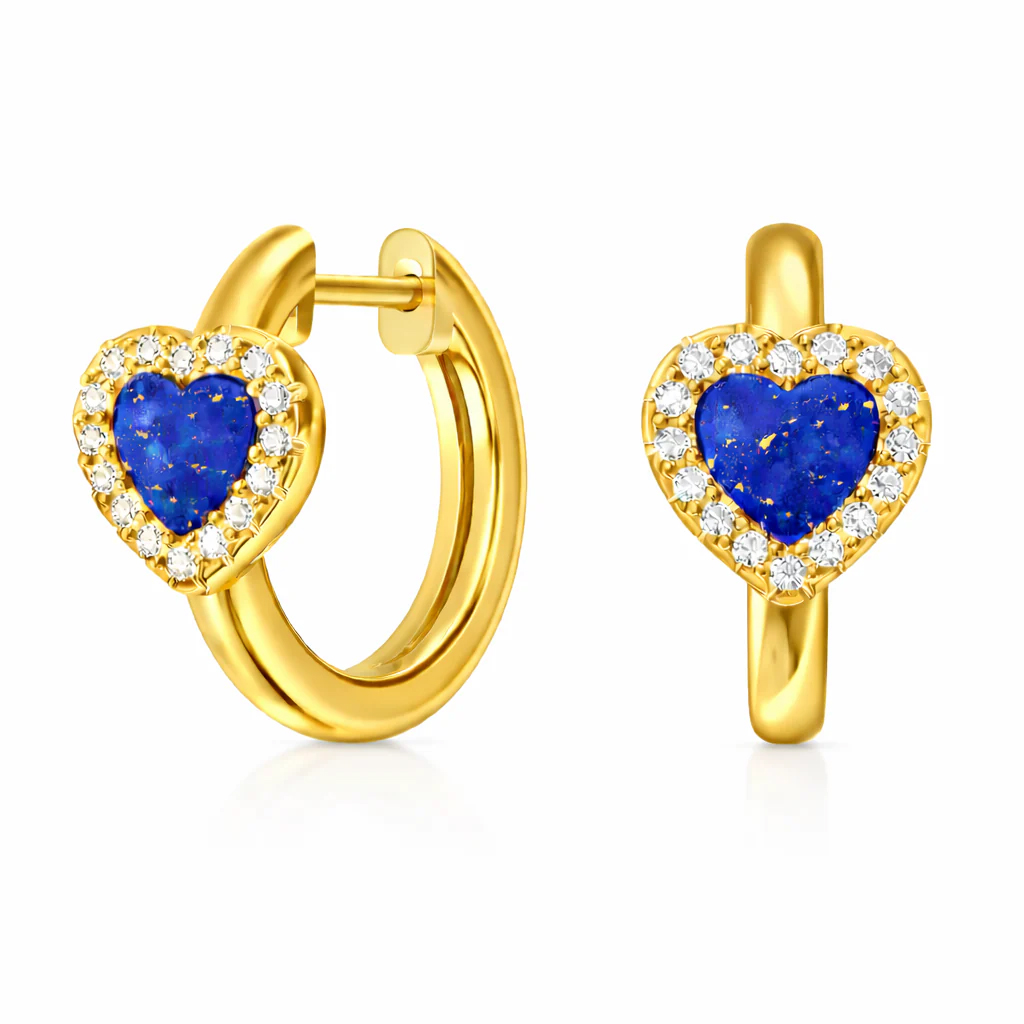 A pair of gold hoop earrings featuring heart-shaped blue stones, surrounded by a halo of small clear gemstones.