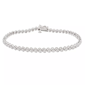 A white gold tennis bracelet featuring a series of round, bezel-set diamonds with a box clasp closure.